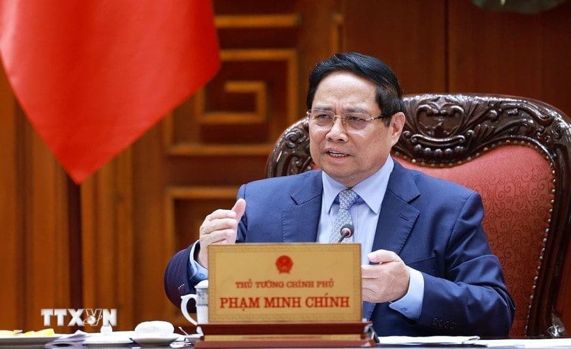 នាយករដ្ឋមន្ត្រី Pham Minh Chinh បានដឹកនាំកិច្ចប្រជុំស្តីពីការពន្លឿនការអនុវត្តគម្រោងផ្លូវដែកតភ្ជាប់វៀតណាម និងចិន។ (រូបថត៖ Duong Giang/VNA)