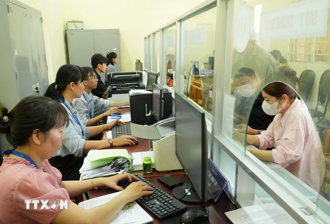 ttxvn-chinh-quyen-dia-phuong-2-cap-1.jpg