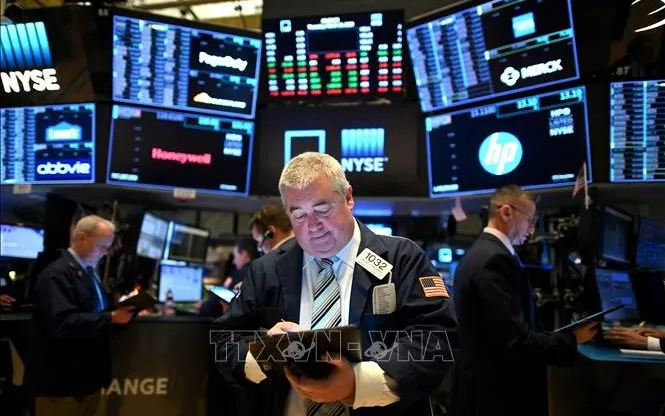 ABD, New York Borsası'ndaki yatırımcılar. Fotoğraf: AFP/VNA