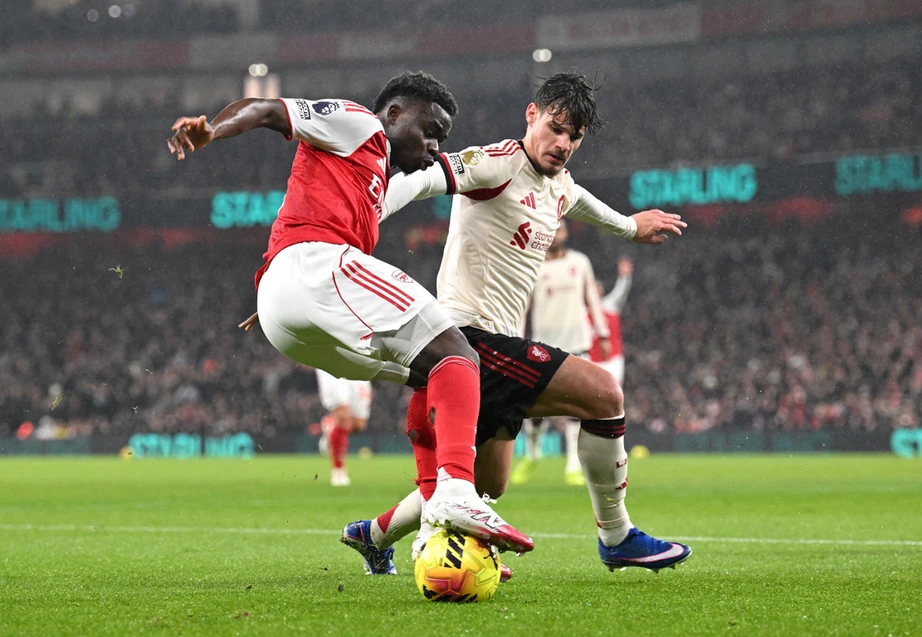 프리미어 리그: 리버풀, 아스널과 극적인 무승부 - 이미지 1. Ngoại hạng Anh: Liverpool hòa kịch tính Arsenal- Ảnh 1.