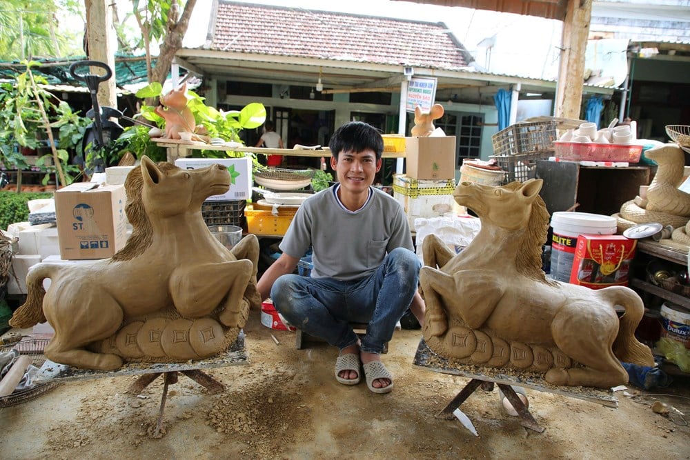 Visita a Thanh Ha per vedere i vasai che realizzano le mascotte per dare il benvenuto alla primavera - foto 10