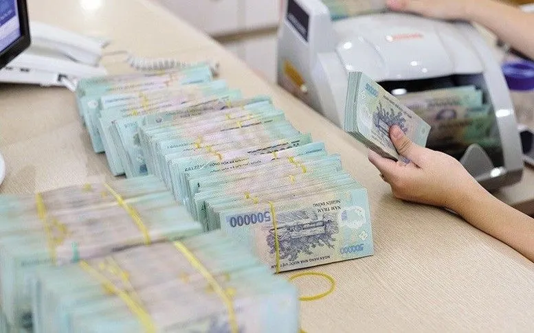 Lãi suất ngân hàng biến động trái chiều - Ảnh 1.