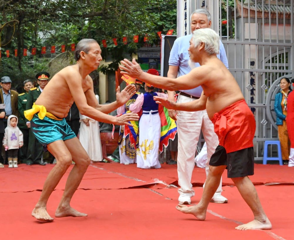 ຈິດໃຈຂອງຄວາມກ້າຫານຢູ່ສະໜາມມວຍປ້ຳໃນບ້ານມາຍດົ່ງ - ຮູບທີ 11