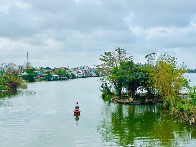 Città vecchia di Bao Vinh: un vivace porto commerciale dell'antica Hue - Foto 19.