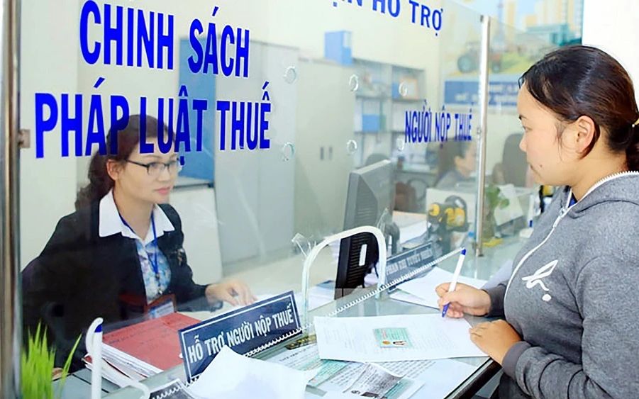 Nâng ngưỡng miễn thuế, khoan thư sức dân- Ảnh 2.