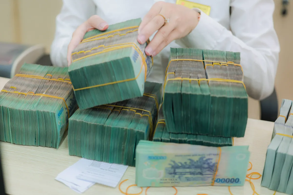 Giảm lãi suất cho vay thúc đẩy tăng trưởng - Ảnh 2.