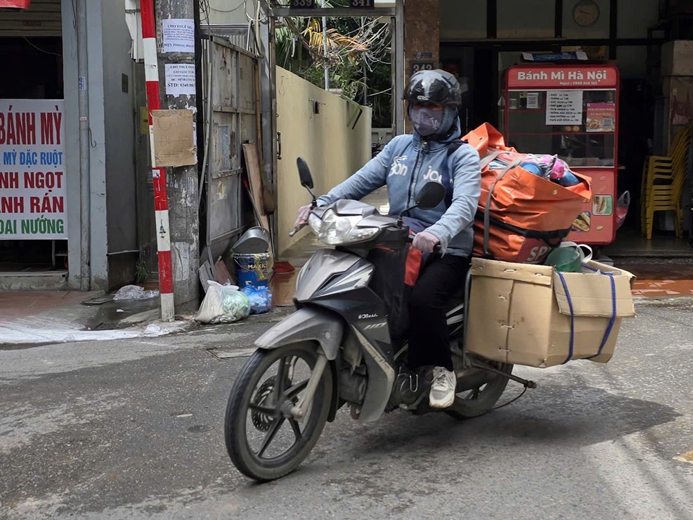 Różne style mody chroniącej przed słońcem w Hanoi - zdjęcie 4