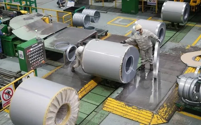 Ouvriers de l'usine Baoshan Iron & Steel Co. dans le district de Baoshan, à Shanghai, en Chine - Photo : Bloomberg Công nhân tại nhà máy Baoshan Iron & Steel Co. ở quận Bảo Sơn, Thượng Hải, Trung Quốc - Ảnh: Bloomberg
