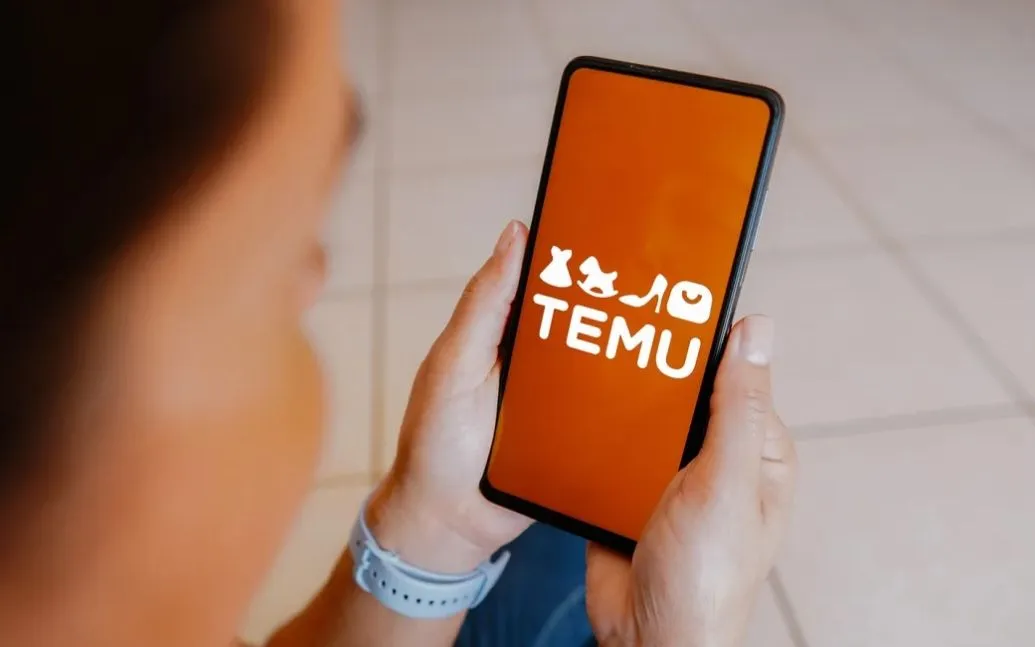 Logo của Temu trên màn hình điện thoại thông minh. Ảnh: CNN