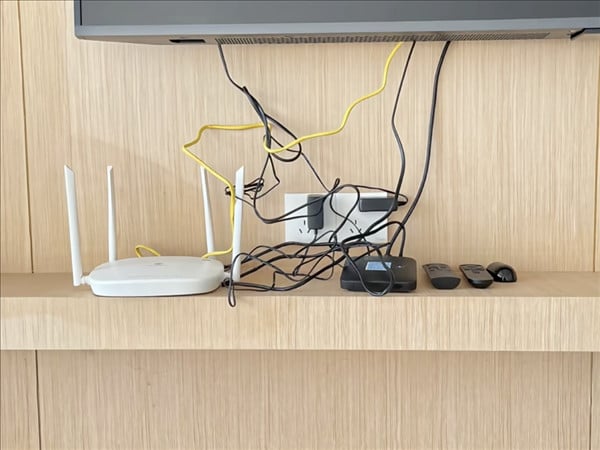 The WiFi router is located in the living room.