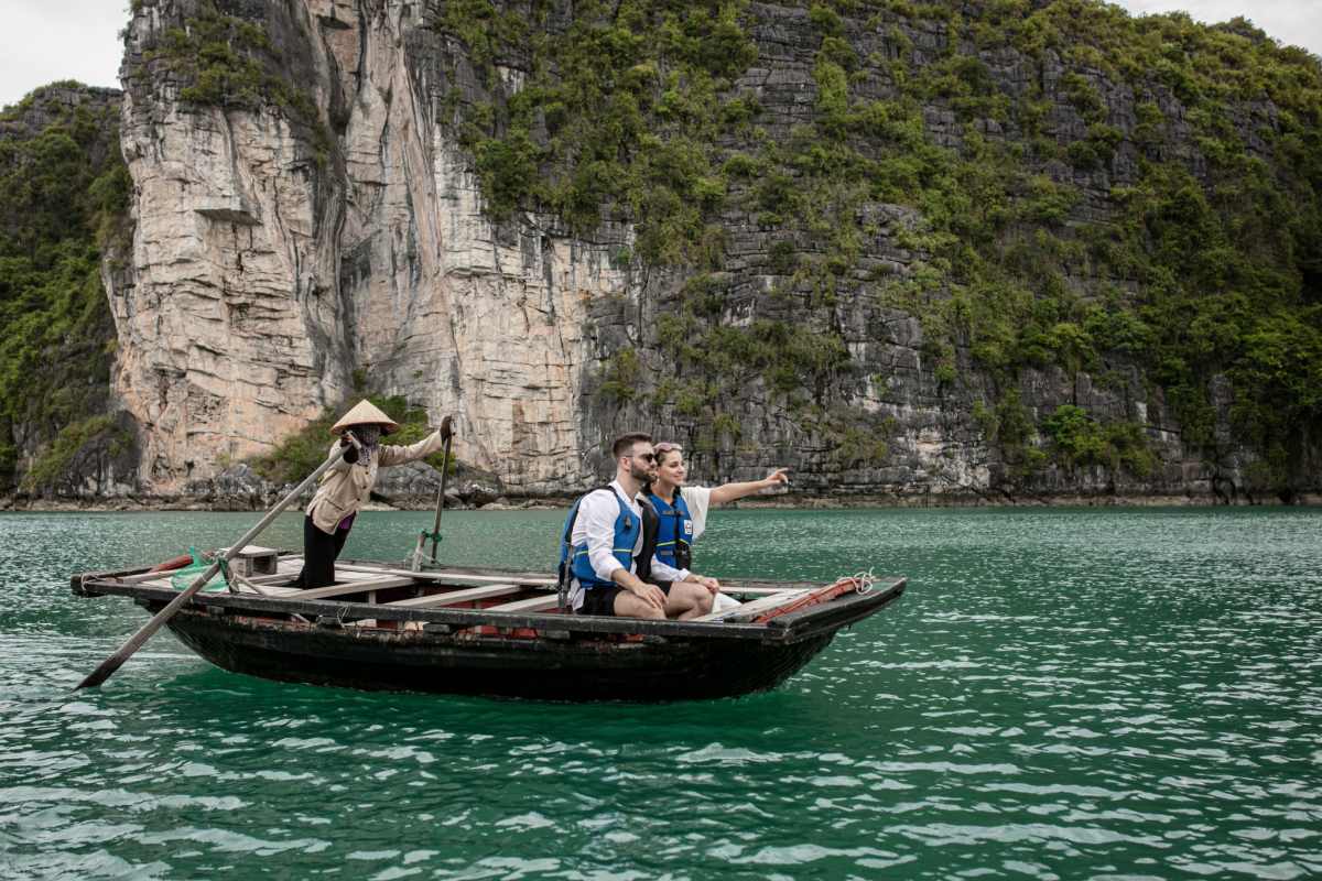 International tourists admire the scenery of Vietnam's Gulf of Tonkin. Photo: Lux Cruises