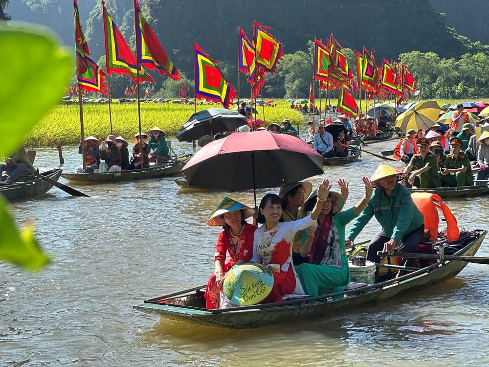 និញប៊ិញ៖ ភាពទាក់ទាញនៃពិធីបុណ្យប្រពៃណីសម្រាប់ទេសចរណ៍ - រូបថតទី ៤