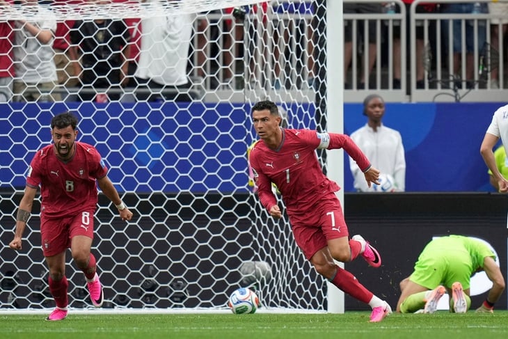 Vượt mặt Messi, Ronaldo lập kỷ lục tại World Cup - Ảnh 1.