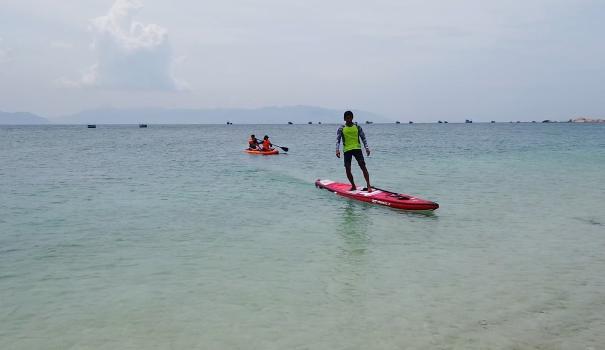 Gallery - Escape the city and head to Hon Cau, where you can touch a green paradise amidst the sea and sky. - image 11