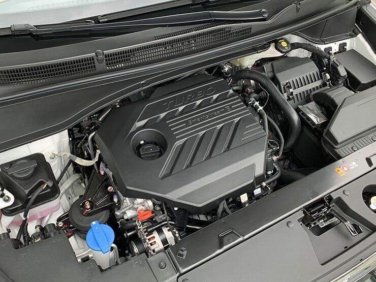 The gear selector is a push-button type located on the center console.