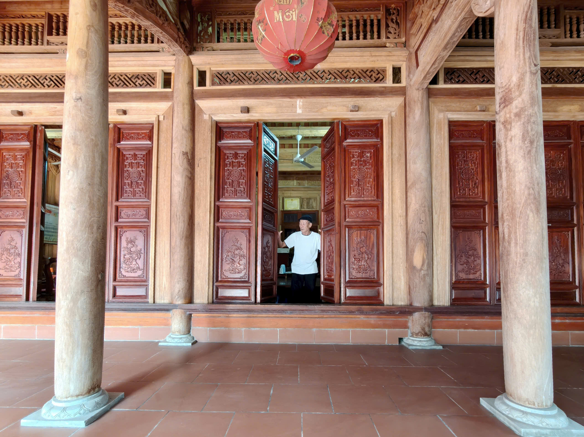 Ngôi nhà gỗ của ông Hoàng Văn Cư. Ảnh: Linh Linh.